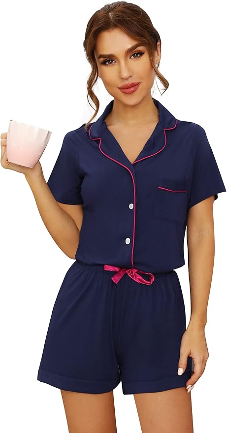 Bamboo short-sleeve pyjama set in navy with red piping, featuring button-up top and relaxed fit shorts.