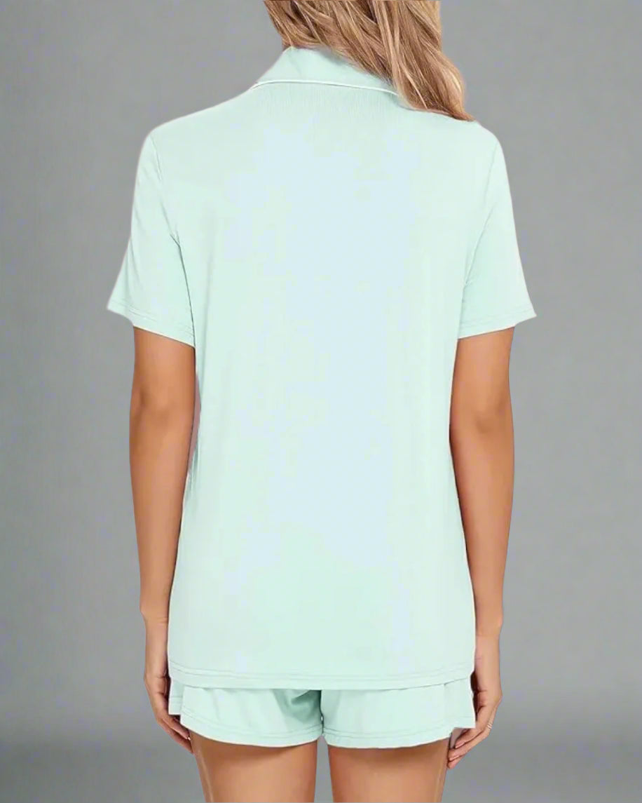Close-up of button-up front and collar on light mint green bamboo pyjamas
