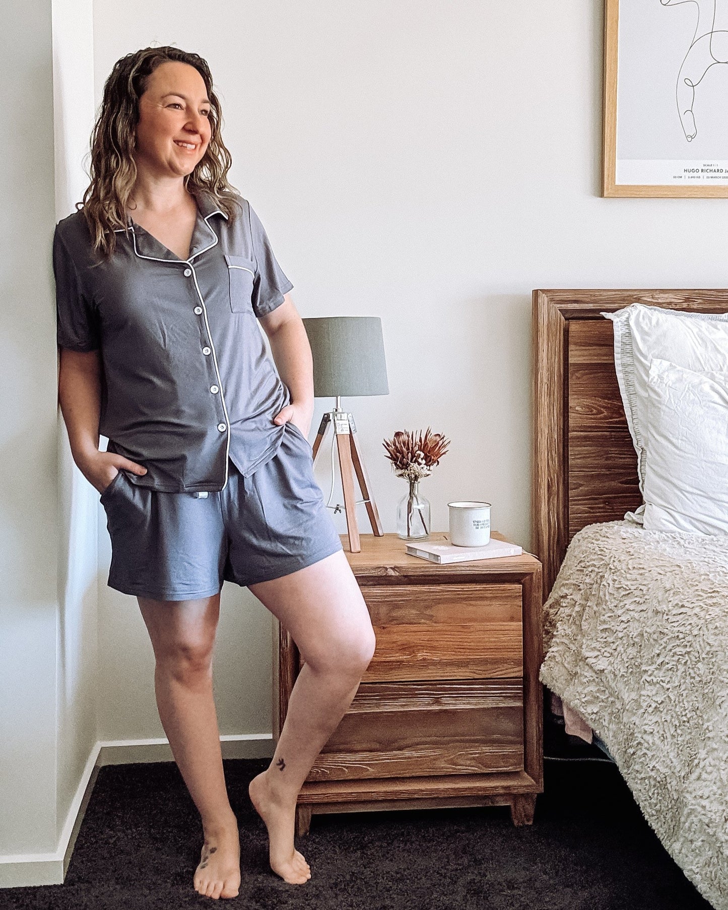 Woman wearing slate grey bamboo short sleeve pyjama set – Bamboo Sleeps