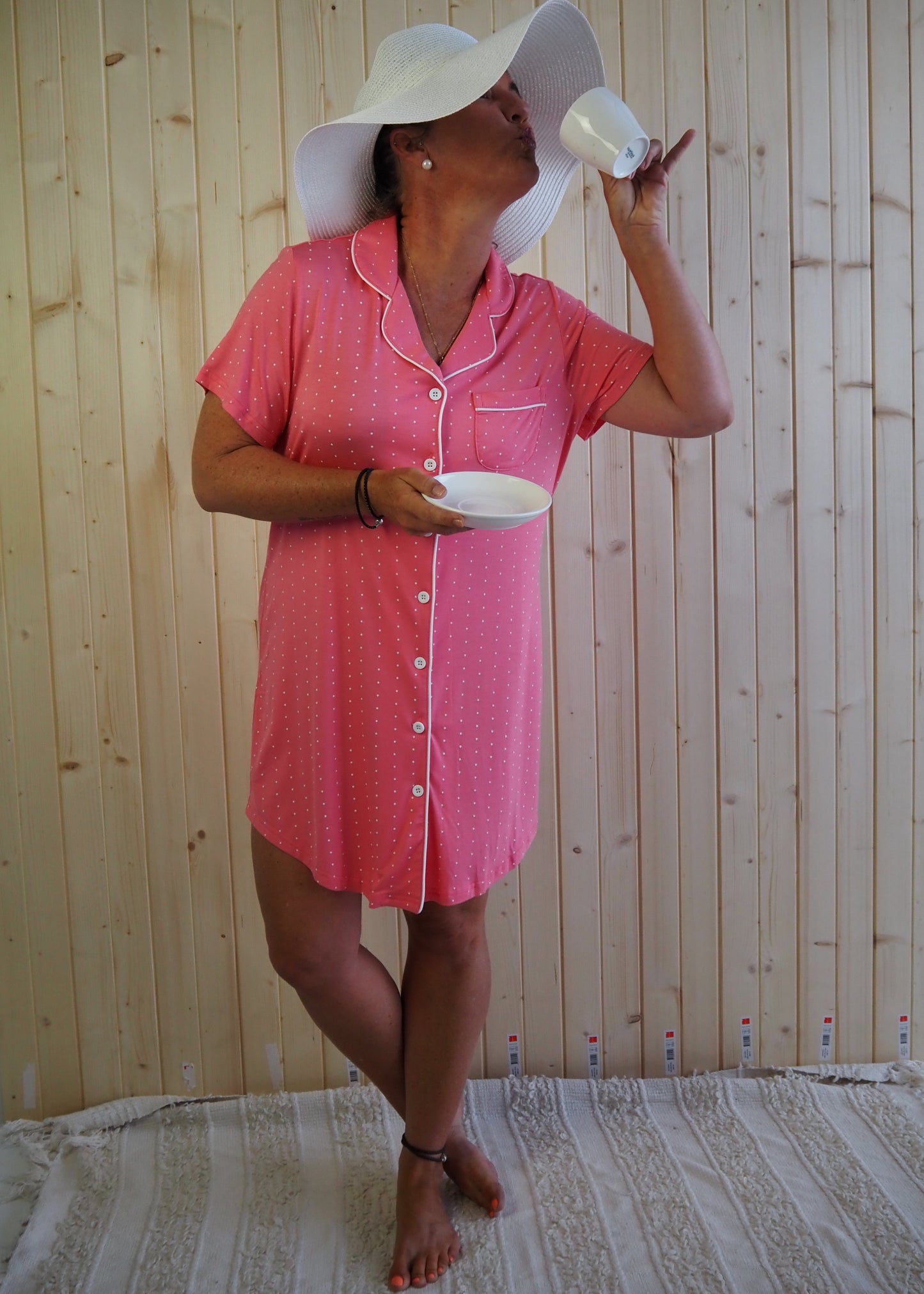 Close-up of button-up detail on coral pink bamboo nightie, designed for nursing and easy wear